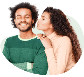 smiling young man and girl